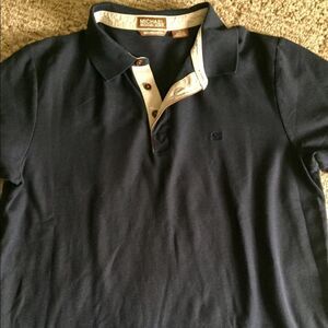 Great polo shirt by Michael Kors in size large
